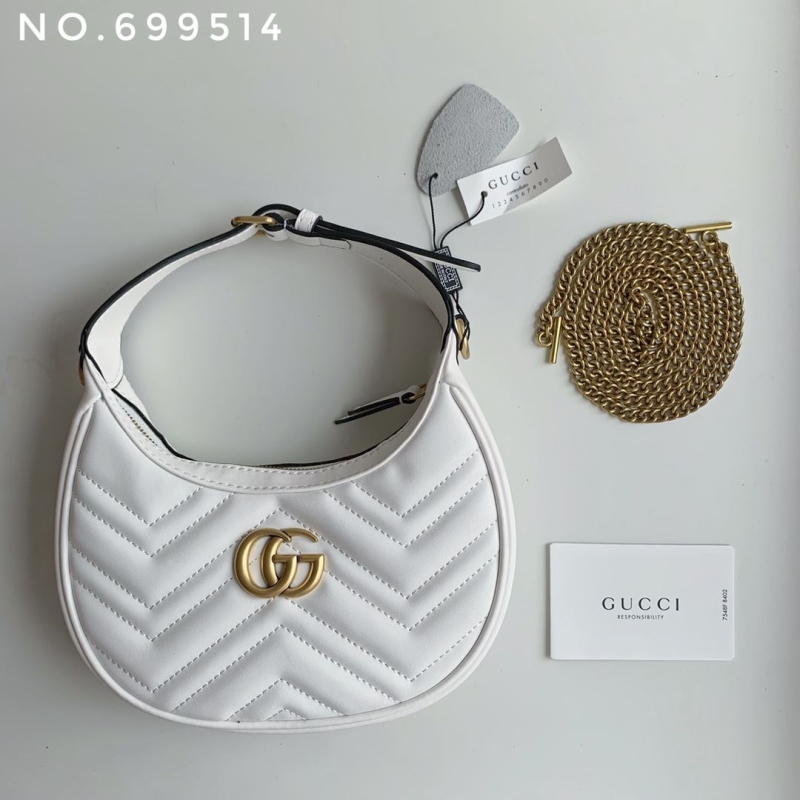 G*u*i top handle bags
